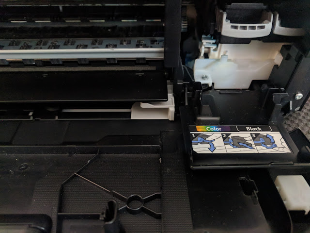 Dentro de impresora Canon para tomar cartucho de tinta