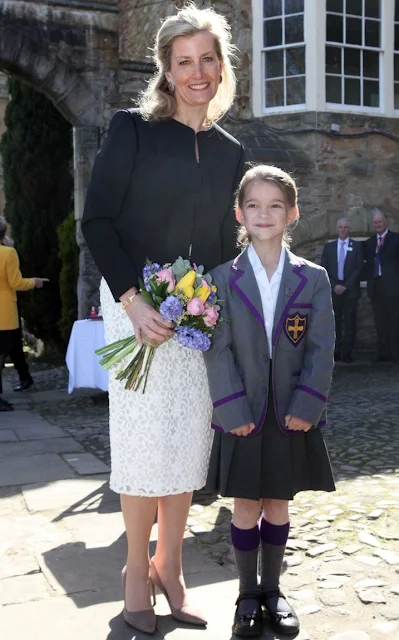Sophie,Countess of Wessex wore Burberry London Lace Pencil Skirt, Sandro Valina Jacket, Prada Suede Pumps