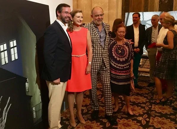 Hereditary Grand Duchess Stephanie wore a orange dress by Prada and Prada shoes at the opening of exhibition FLUX Feelings.
