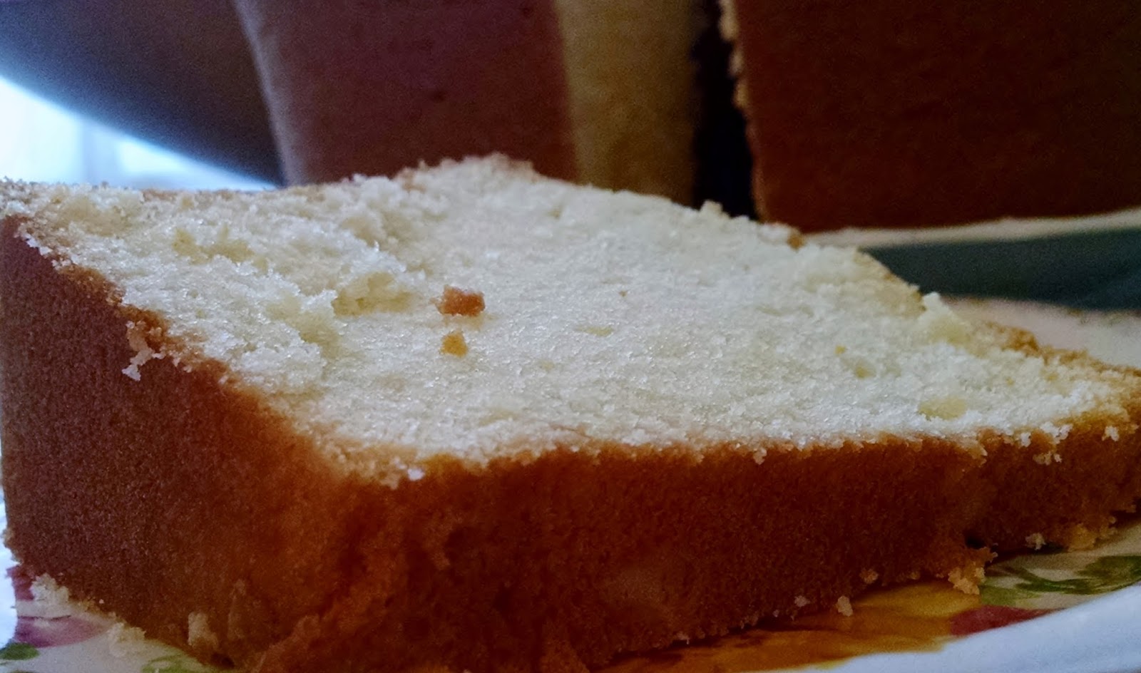 Sour Cream Vanilla Almond Pound Cake Topped with Fresh Strawberries