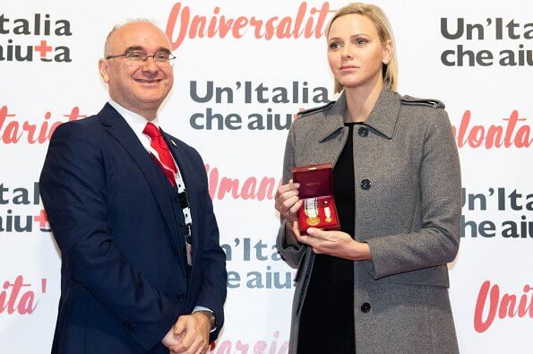 Princess Charlene wore Louis Vuitton wool cashmere grey coat with black Jimmy Choo pumps. Italian and Monegasque Red Cross