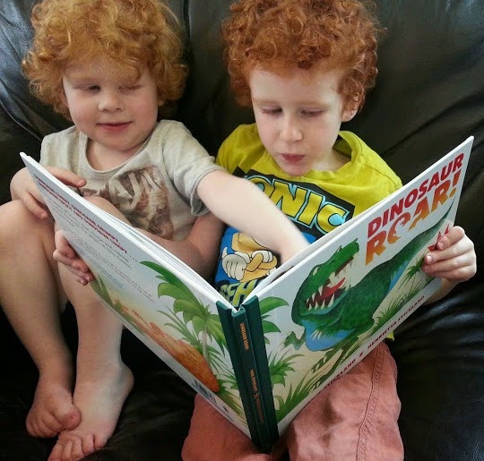 4 and 5 year olds reading Dinosaur Roar 20th anniversary edition