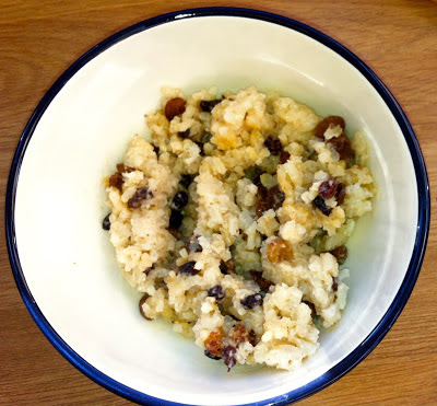 Photograph of rice pudding with raisins in a bowl