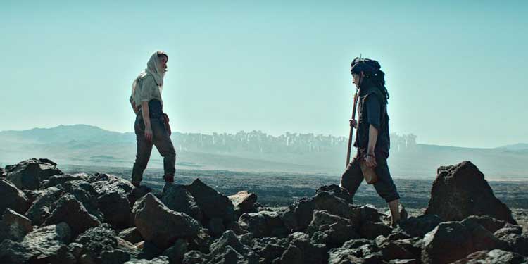 Catherine Langford explores the desert with Kasuf in Stargate Origins.