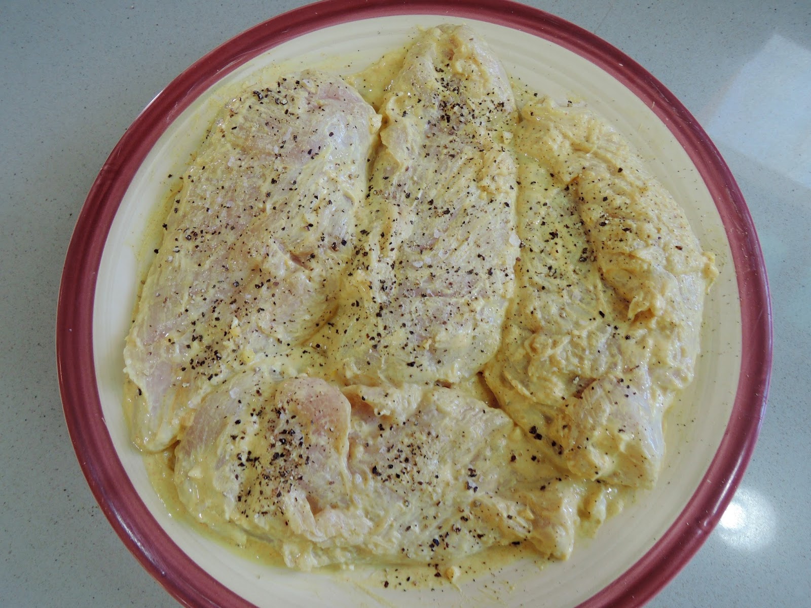 The Briny Lemon YogurtMarinated Chicken Breasts with LemonHerb Drizzle