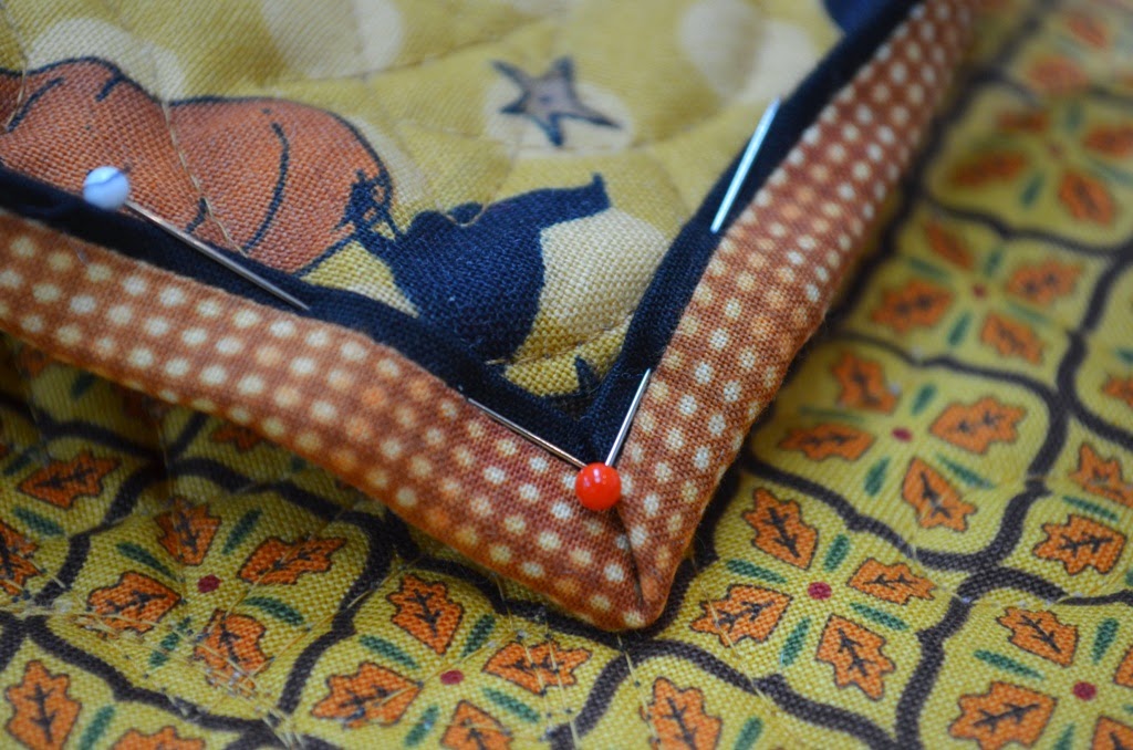 NOTE I always take a minute to PRESS the binding away from the quilt