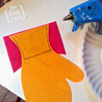 free pattern for a cute felt mitten ornament and gift card holder by the funky felter