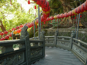 Chinese lanterns along a stairway with traditional Chinese designs at Zhishan Park in Taipei