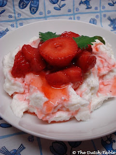 Plate with fresh hangop and strawberries