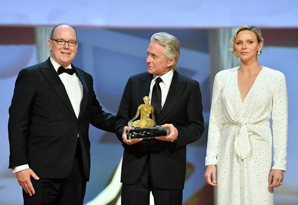 Golden Nymph Award Michael Douglas. Princess Charlene is wearing Carolina Herrera dress. Maria Carolina, Princess Camilla and Maria Chiara