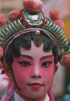 Beautifully made up face of female Chinese opera singer