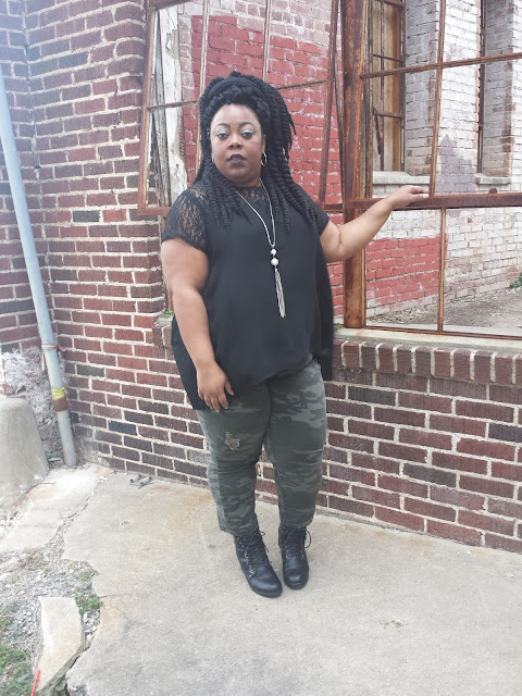 Plus size blogger wearing glam army fatigue and Havana Mambo twists.