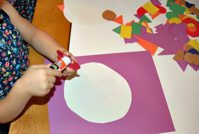 Gluing shapes to clown craft