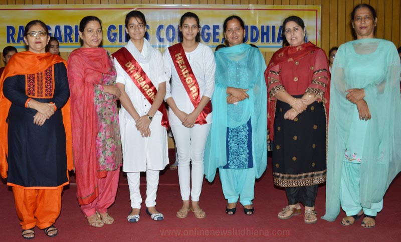 Chosen head girl and deputy head girl with college Principle and teaching staff Chosen head girl and deputy head girl with college Principle and teaching staff