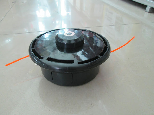 กระปุกเอ็นตัดหญ้า พร้อมเอ็นอัตโนมัติ ใช้กับเครื่องตัดหญ้าทุกรุ่น-