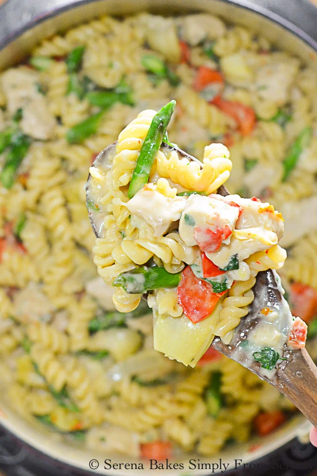 One Skillet Chicken Artichoke Asparagus Sun-dried Tomato Pasta is a delicious dinner time favorite.