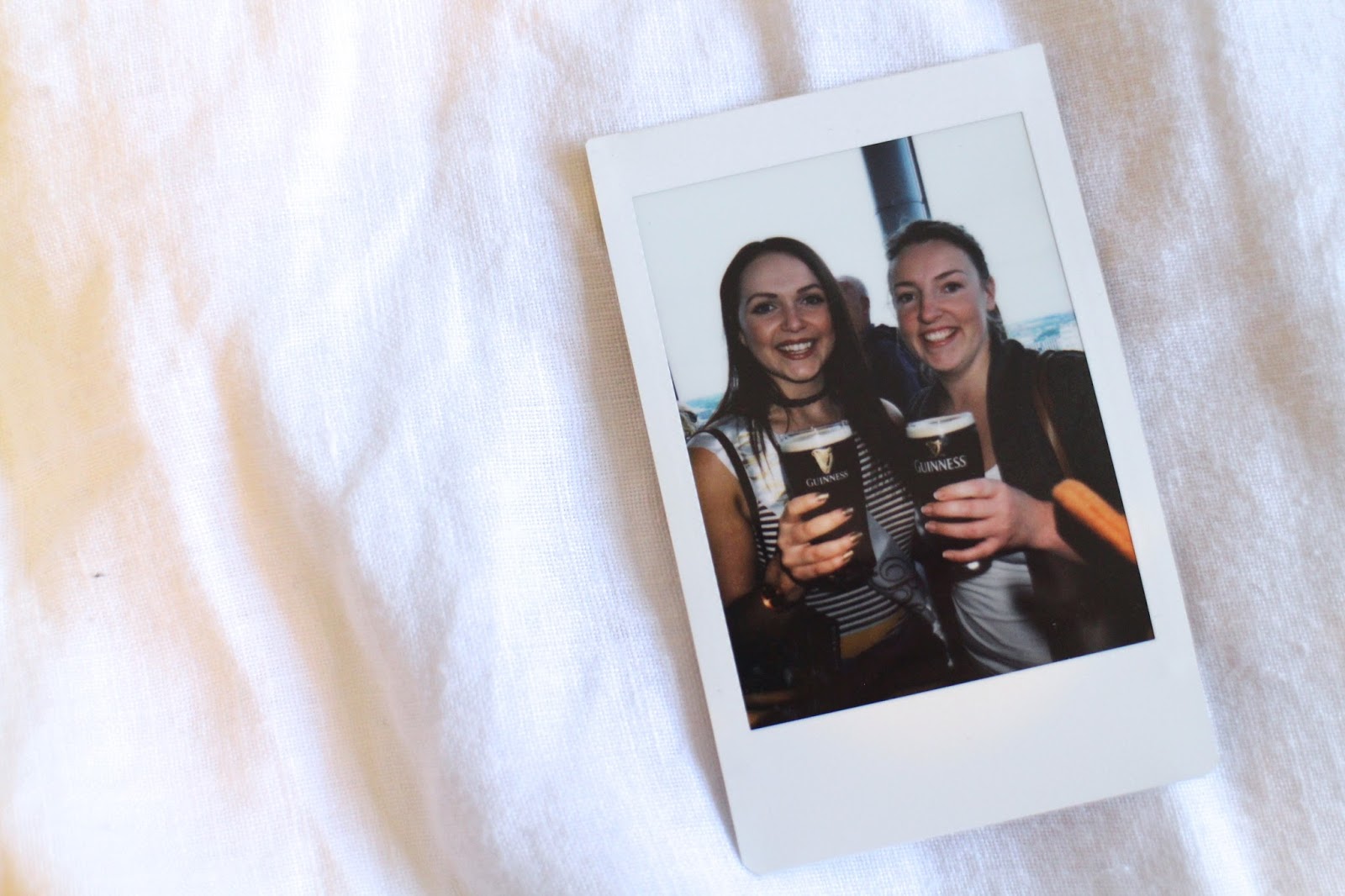 Instax photo of best friends with Guinness
