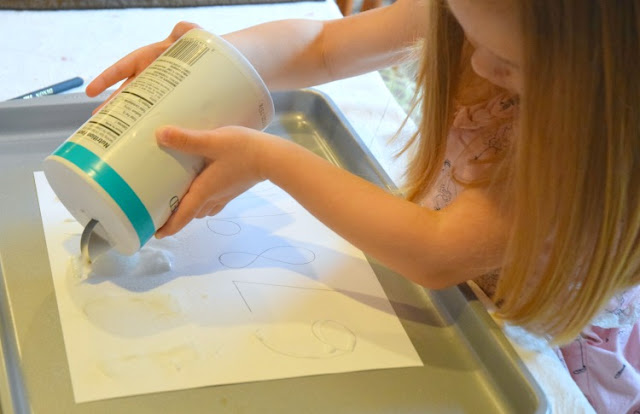 Salt painted numbers. Help preschoolers with their math by letting them learn numbers with this fun craft technique! Also great for fine motor development.