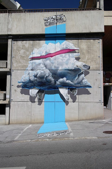 Art duo Never Crew also left their mark in Crans-Montana with their newest mural created for Vision Art Festival. Created on a 3 storey facade of a local parking garage, the piece is nicely blending with the environment it's placed in.
