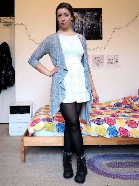 Princess Leia Star Wars Disneybound outfit of white dress, grey cardigan, and black tights & biker boots