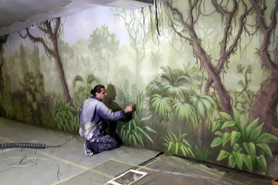 Malowanie obrazów na ścianie, obraz malowany na ścianie, motyw dżungli, graffiti artystyczne namalowane w mieszkaniu 