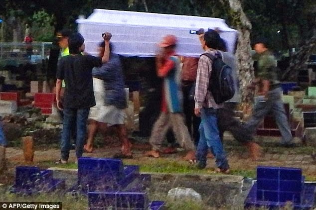 burial photos nigerian executed indonesia