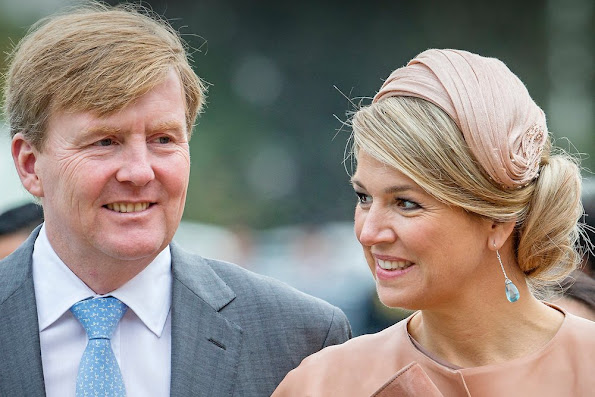 Queen Maxima and King Willem-Alexander of The Netherlands visit the Sino-Dutch Diary Development Center on October 25, 2015 in Beijing, China.