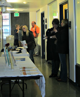 Participants gathered at the AT Lab to check out AAC devices.
