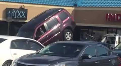 Οδηγός SUV προσπαθεί να ξεφύγει από τον γερανό της τροχαίας