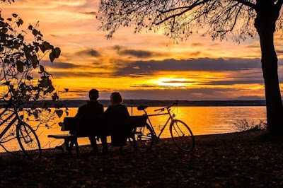 Small Delights Couple watching Sunset on a bench