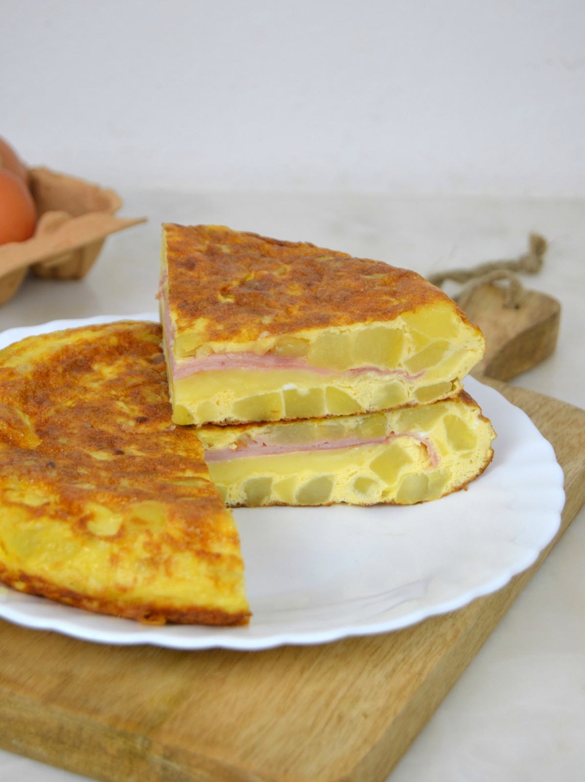 Tortilla de patatas rellena de jamón y queso Cuuking! Recetas de cocina