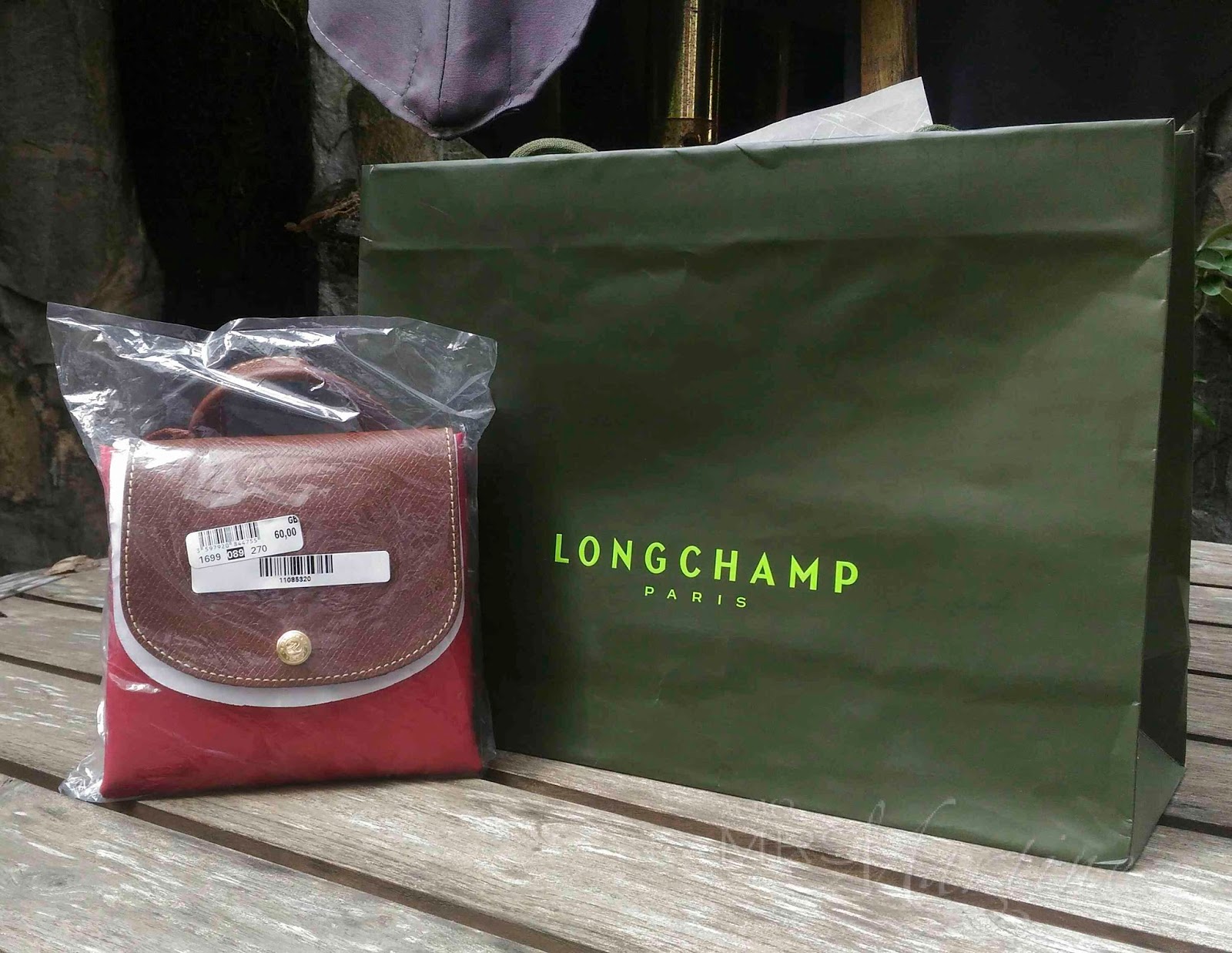 how to fold longchamp backpack