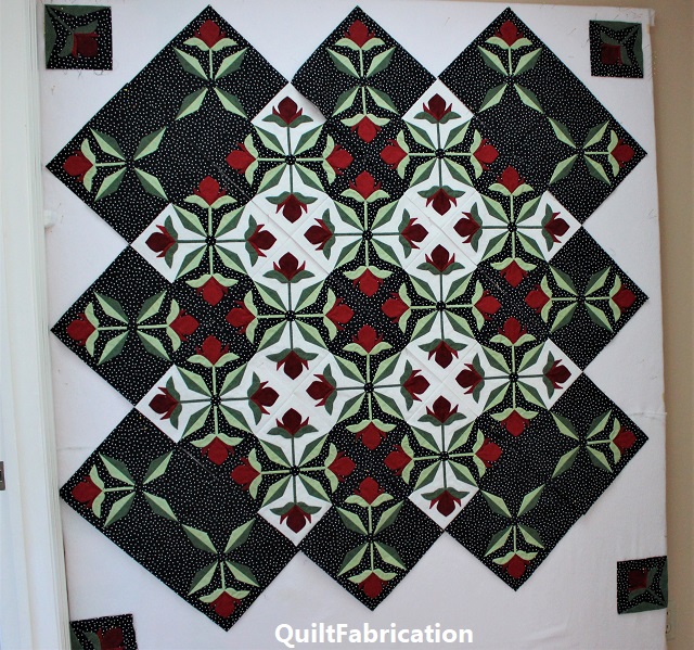 Mediterranean Rose quilt by QuiltFabrication