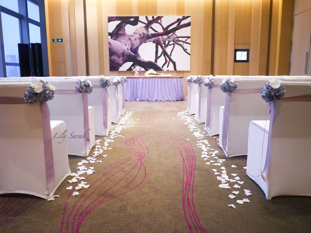 Ceremony aisle decoration with vintage purple bouquets
