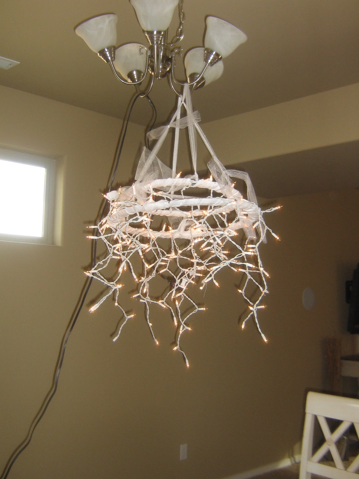 Home is where they love you: Christmas Light Chandelier