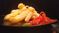 Golden fried pineapple fingers with garnished plate dinner ideas Food Recipe