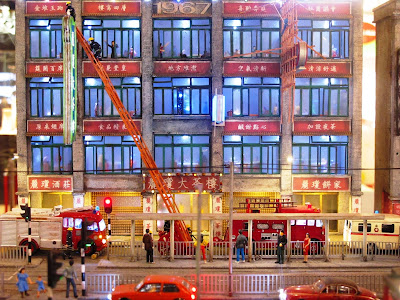 Model Hong Kong office building and street.