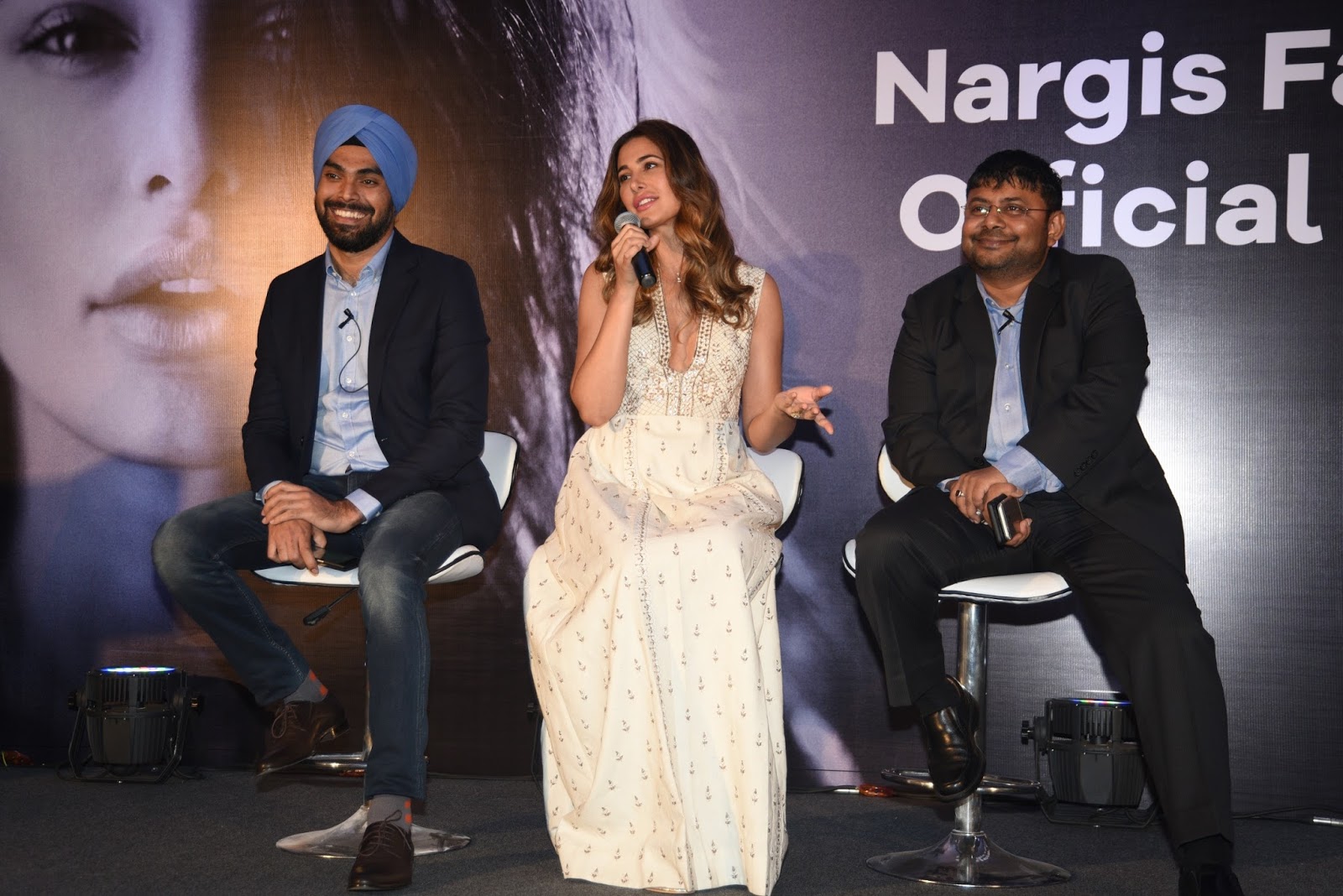 Nargis Fakhri Looks Hot in a White Dress At The Launch Event of Her Own App in Mumbai