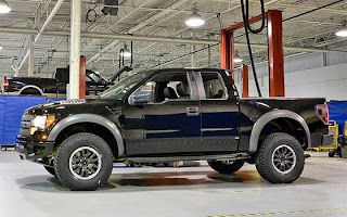 white ford raptor lifted