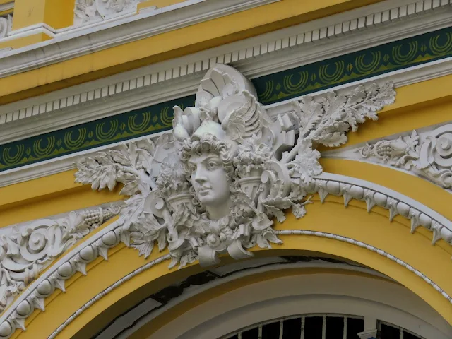Non-touristy Vietnam: Face on the facade of the post office in Ho Chi Minh City Vietnam