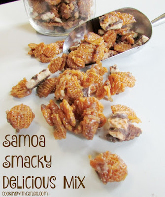 This Samoa Smacky Delicious Mix is sure to be your new favorite snack mix. It has all of the caramel, coconut, chocolate and shortbread flavors of your favorite Girl Scout Cookie in a highly delicious and addictive snack mix! #SundaySupper