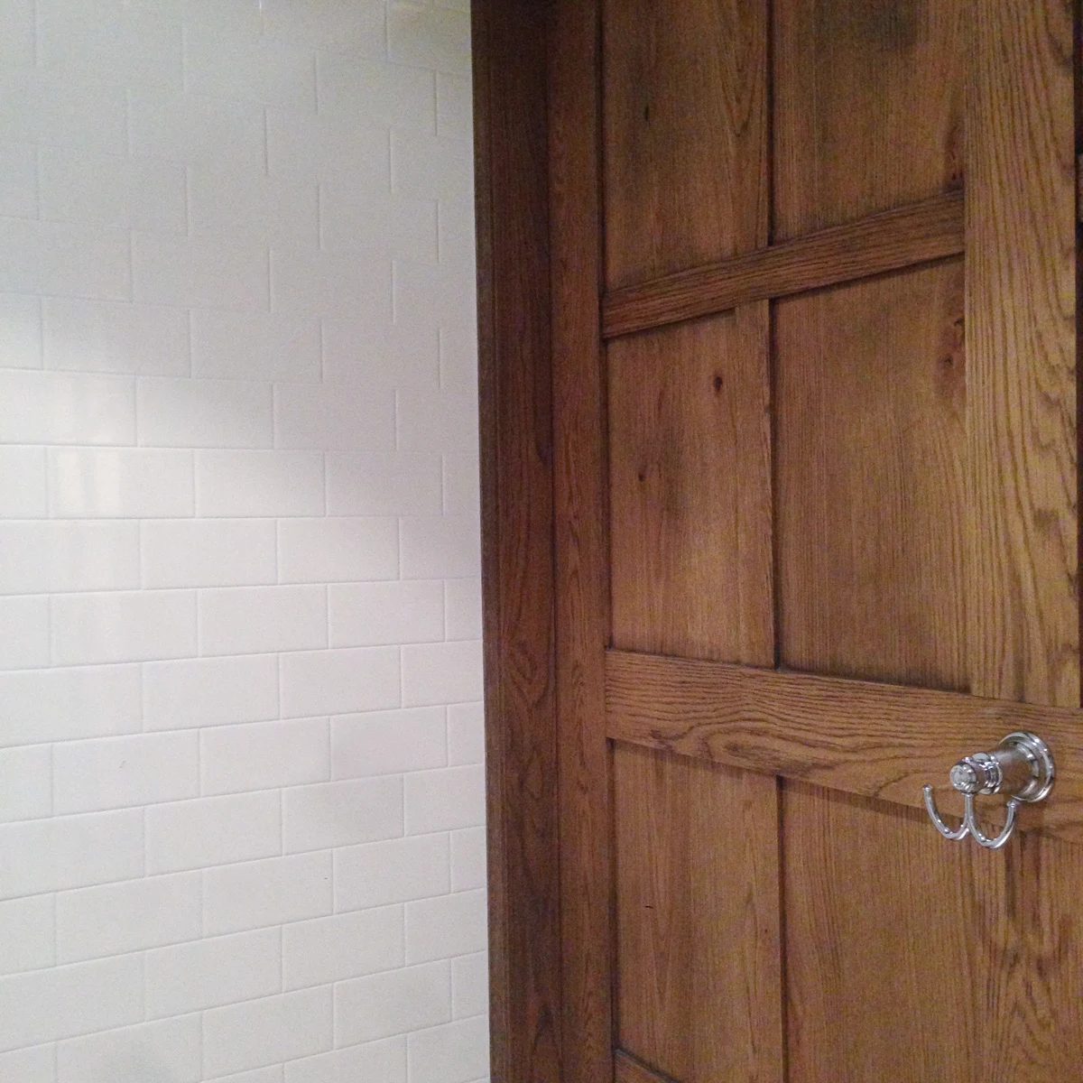 French bistro style, wood panelling, subway tile wall