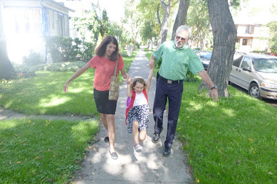 Wallace and Nancy Braud escorting Grace to first day of kindergarten in Winnipeg, Manitoba Wallace and Nancy Braud escorting Grace to first day of kindergarten in Winnipeg, Manitoba