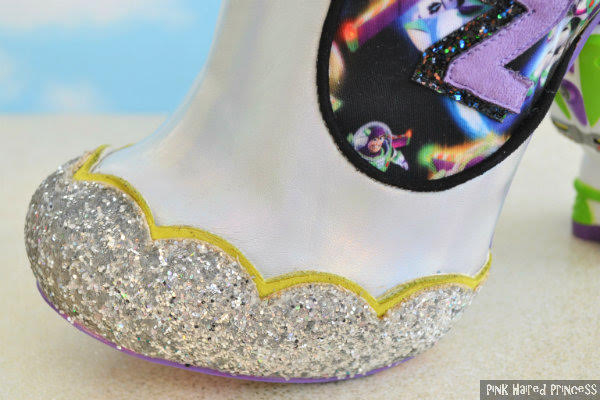 Irregular Choice You Are A Toy! silver glitter toe close up of scalloped silver glitter on holographic toe of ankle boot