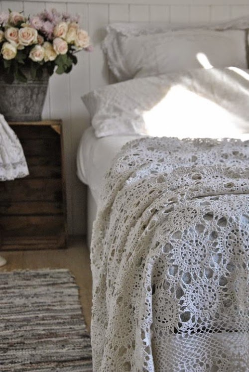 Irina: Crochet bed cover.