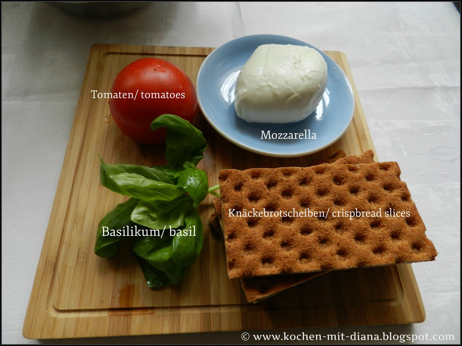 Crackers with mozzarella and tomato Cooking with Diana