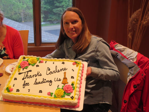 woman with a decorated cake