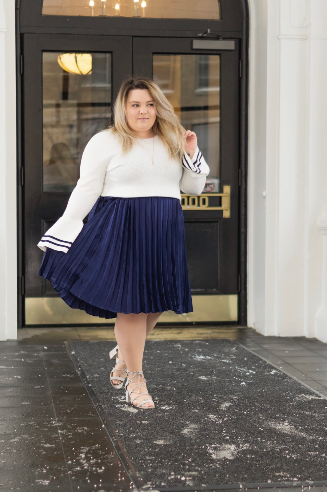 full figured fashion, natalie Craig, natalie in the city, plus size fashion blogger, Chicago plus size fashion blogger, embrace your curves, eff your beauty standards, plus size pleated midi skirt, bell sleeve sweater, affordable plus size clothing, eloquii, eloquii Chicago location