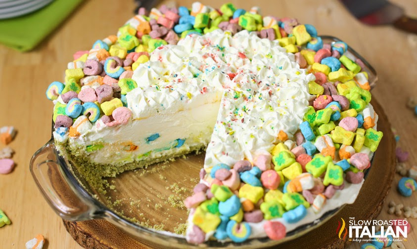 Lucky Charms No-Bake Ice Box Pie with a slice cut out of the pie