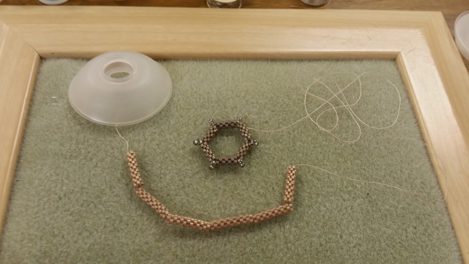 Caring Stitcher Working on a beading PHD